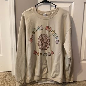 Large, tame crewneck sweater